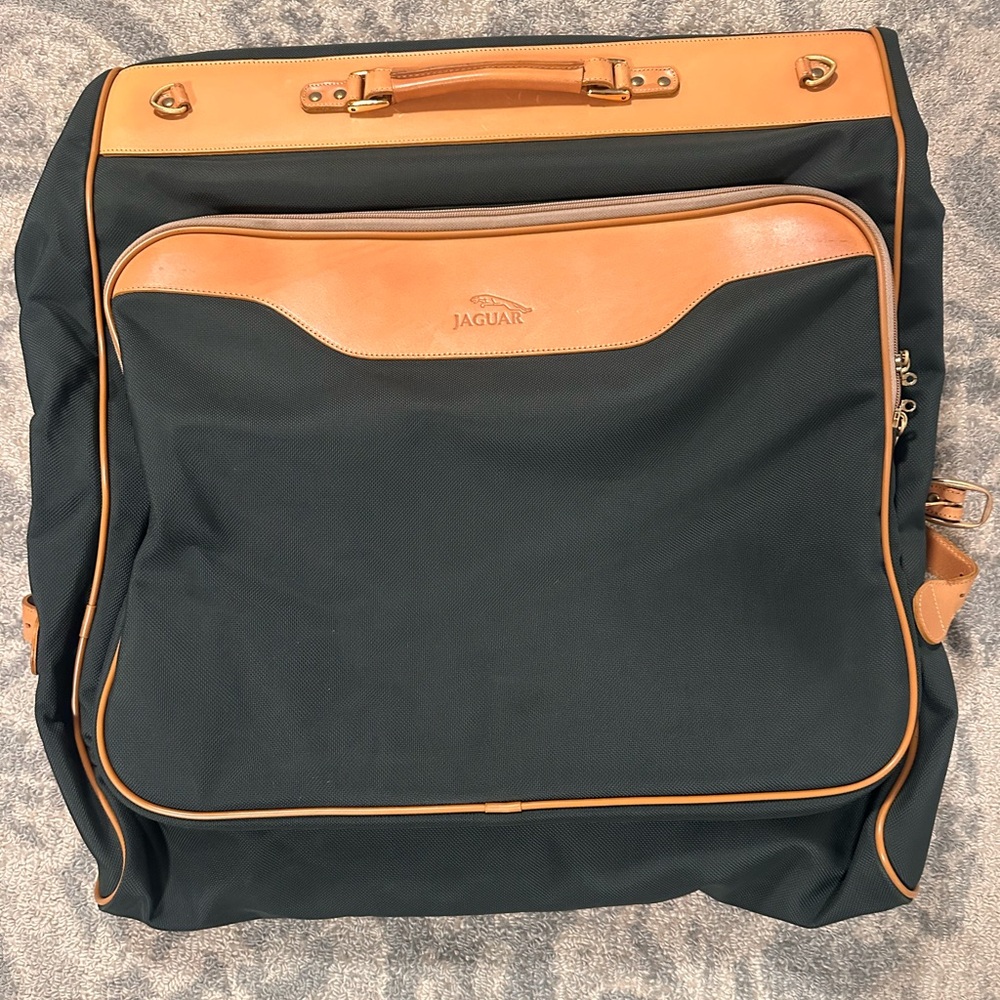 Jaguar Brand vintage canvas and leather hunter green suit carrier
